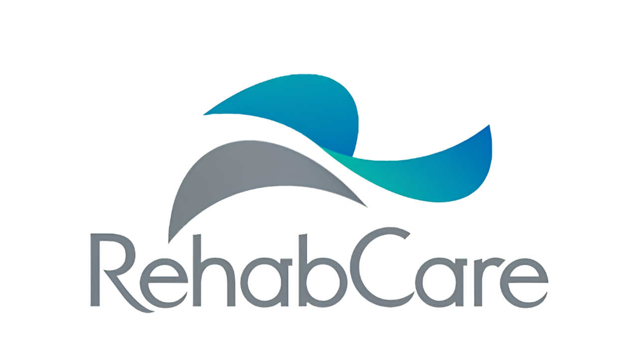 RehabCare logo with blue and gray abstract wave shapes above the company name in gray text.